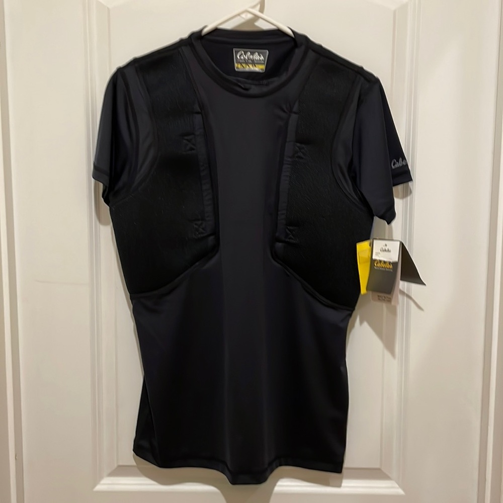 Cabela’s tactical shirt with holster pockets.